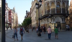 people walking by the center of Seville Spain